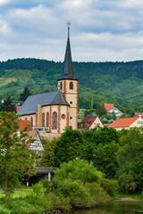 Fototapeta na wymiar A church on the bank of the Main River in Baden-Wurttemberg, Germany