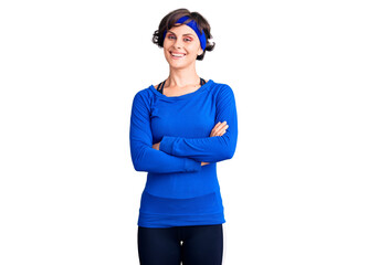 Beautiful young woman with short hair wearing training workout clothes happy face smiling with crossed arms looking at the camera. positive person.