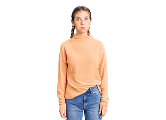 Fototapeta premium Beautiful caucasian woman with blonde hair wearing casual winter sweater puffing cheeks with funny face. mouth inflated with air, crazy expression.
