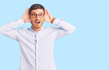 Handsome young man with bear wearing elegant business shirt and glasses smiling cheerful playing peek a boo with hands showing face. surprised and exited