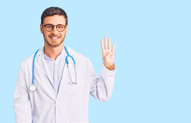 Handsome young man with bear wearing doctor uniform showing and pointing up with fingers number four while smiling confident and happy.