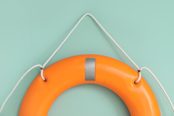 Lifebuoy ring on color background