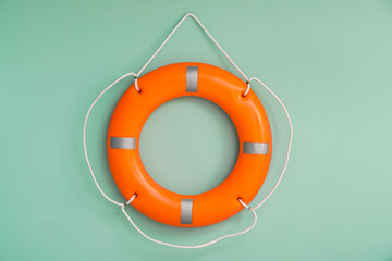 Lifebuoy ring on color background