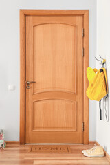 Interior of modern stylish hallway with door mat
