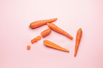 Fresh carrots on color background