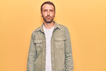 Young handsome man wearing casual clothes depressed and worry for distress, crying angry and afraid. sad expression.