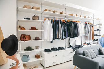 Stylish interior of modern clothes store
