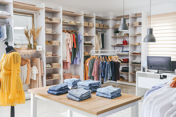 Stylish interior of modern clothes store