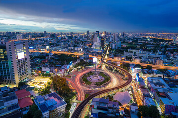 Fototapeta na wymiar Victory Monument during Twilight, a traffic intersection in the heart of the capital city of Bangkok, Thailand.