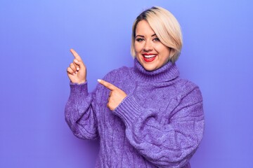 Beautiful blonde plus size woman wearing casual turtleneck sweater over purple background smiling and looking at the camera pointing with two hands and fingers to the side.