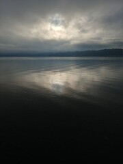 Obraz premium Cloudy Day Over the Ocean