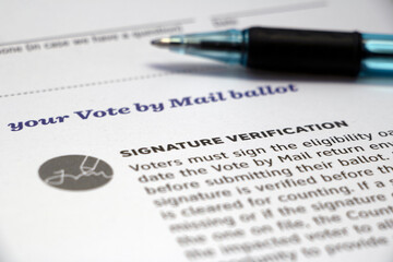 'Signature Verification' Mail Voting info with pen
