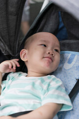 Asian mothers take their children on the subway