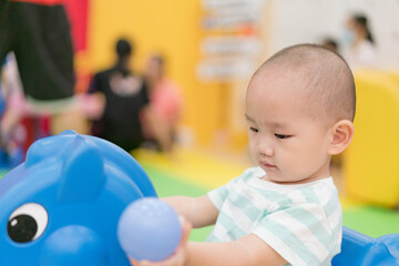 Fototapeta na wymiar Asian Boys play in early childhood institutions