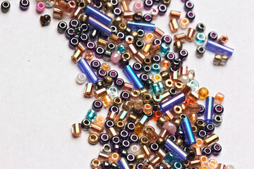 Multicolored glass beads of different shapes