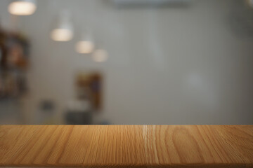 Empty dark wooden table in front of abstract blurred bokeh background of restaurant . can be used for display or montage your products.Mock up for space.