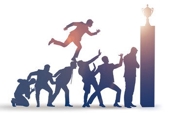 Career progression concept with businessman climbing stairs