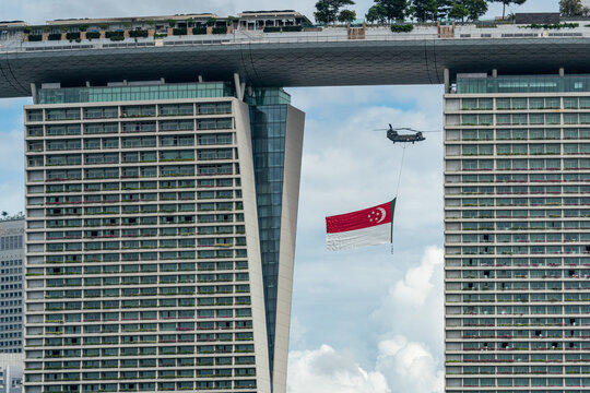 Singapore - July 2020: State Flag flypast by RSAF helicopters for NDP at Singapore.	