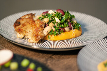 Southwest Bean Salad with red beans, chick peas, cannellini beans, kale, cottage cheese, roast chicken on dark Slate Gray Concrete Wall background