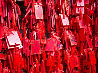 Red lucky charms hanging in Confucius temple in Longmen Grottoes World Heritage Site Near Luoyang City, Henan Province, China, 14th October 2018.
