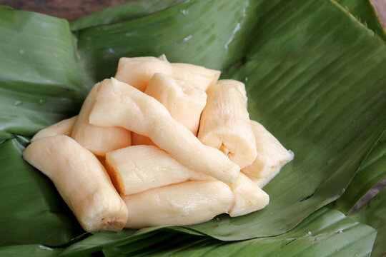Tapai or Tape or Peuyeum are traditional food snack from indonesia, made from fermented cassava. Served on banana leaf