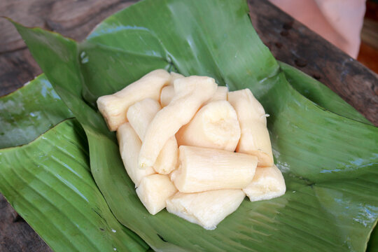 Tapai or Tape or Peuyeum are traditional food snack from indonesia, made from fermented cassava. Served on banana leaf