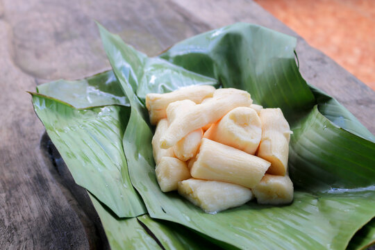 Tapai or Tape or Peuyeum are traditional food snack from indonesia, made from fermented cassava. Served on banana leaf