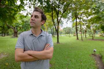 Portrait of man relaxing at the park outdoors