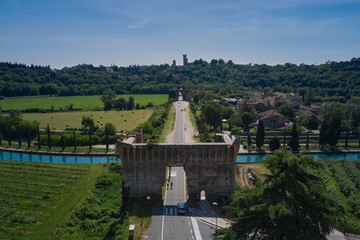 The aerial view of Visconti bridge in Valeggio sul Mincio in Veneto, Italy.