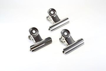 Three  bulldog clips white background