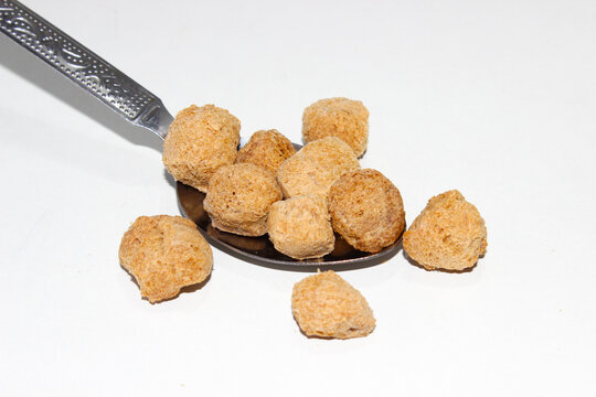A picture of soya chunks on white background