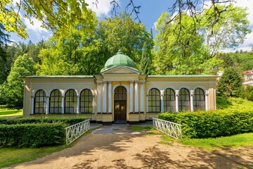 Pavilion of Forest mineral water spring - summer time in Czech spa city Marianske Lazne (Marienbad) - Czech Republic