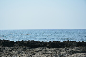 Beach sea water waves and sand shore
