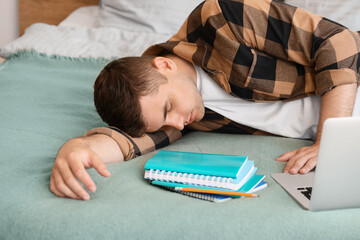 Tired student sleeping at home