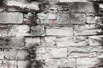 Abstract background old white brick wall with cracks and scratches. Landscape style. Great background or texture.