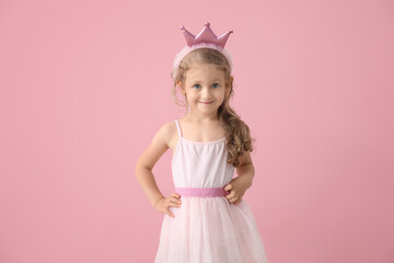 Cute little princess on color background
