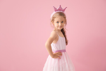 Cute little princess on color background