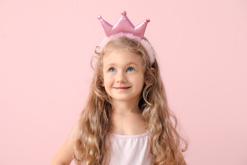 Cute little princess on color background © Pixel-Shot