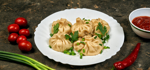 Khinkali on a plate . traditional Georgian cuisine