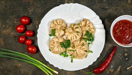 Khinkali on a plate . traditional Georgian cuisine