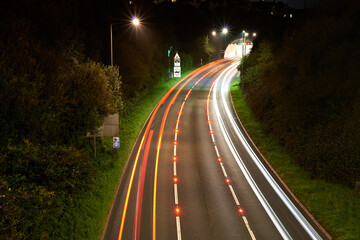 The lights of cars entering the tunnel at Saltash