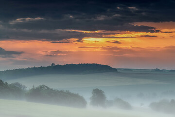 sunrise and morning mist