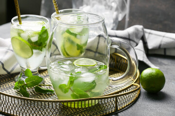 Glassware of fresh mojito on table