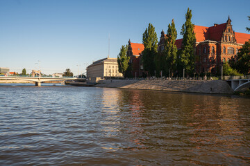 Naklejka premium Wroclaw, Poland August 5, 2020; View of the city of Wroclaw from the perspective of the Odra River.