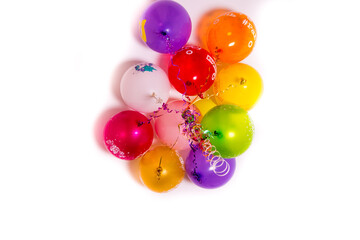 multicolored balloons on a white background