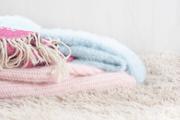 Fototapeta na wymiar Cozy home, warm knitted wool clothes.