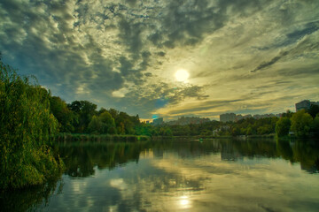 Autumn Sunset On The Lake Beautiful scenic view of the red sunset over a lake