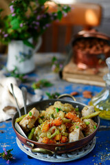 Chicken breast with vegetables and almond.