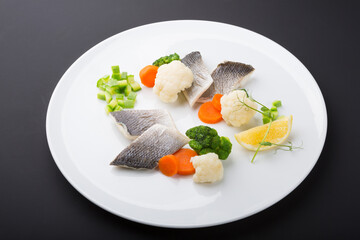 Steamed white fish fillet with vegetables