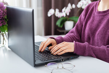 Woman working or learning from home using laptop computer. Freelancer have remote work, online...